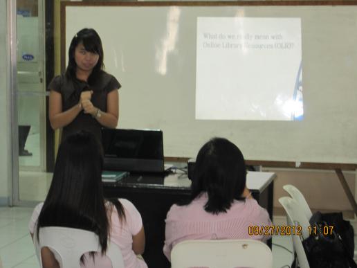 Ms. Bea Castillo, Solution Specialist from CE-Logic, giving product information...